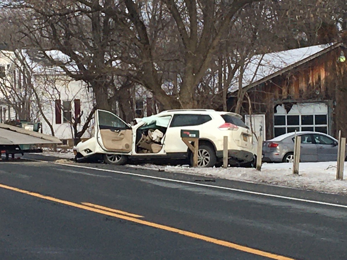 Sscene of a car crash on Rt 20 in Guilderland near Dunsville Road. Police say the car and a garbage truck crashed