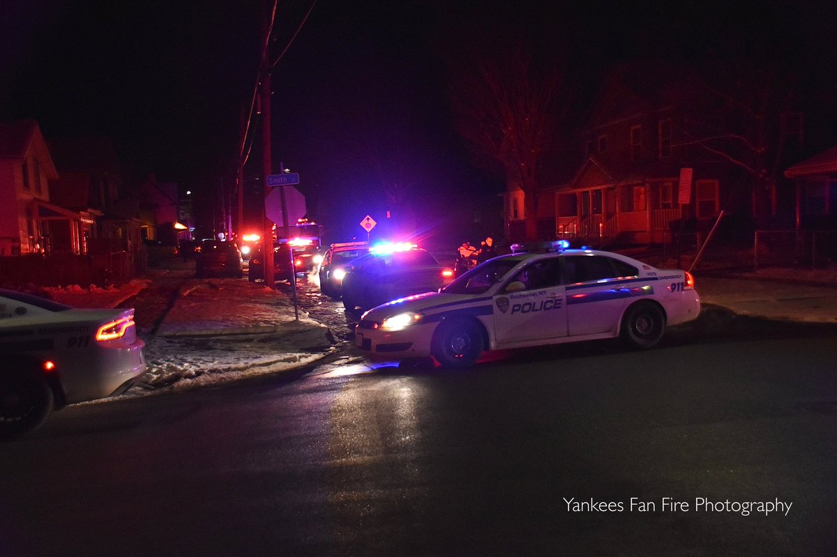 Rochester Police on scene of a shooting on Saxton Street, being assisted by RFD and AMR