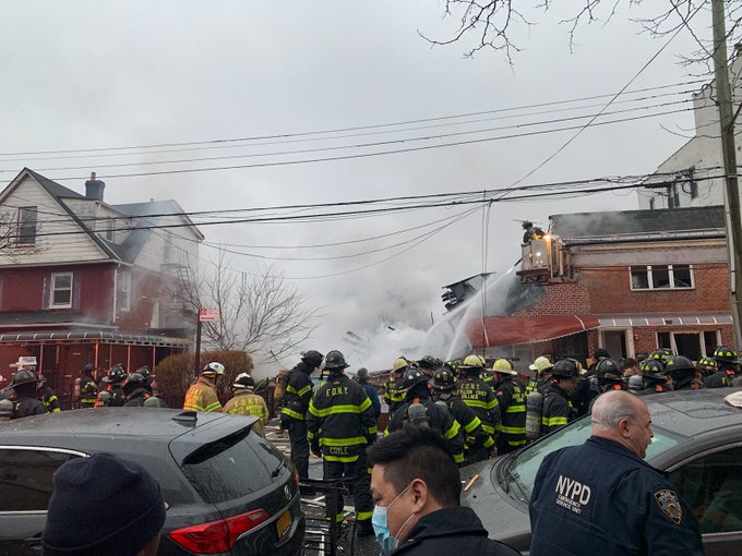 At least one home collapsed after an explosion and subsequent fire in Brooklyn