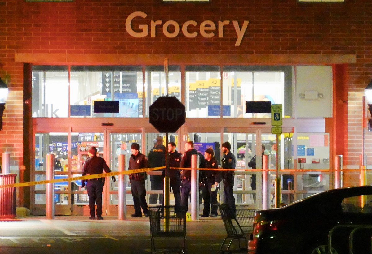 Reported shots fired incident at the Northgate Plaza Wal-Mart in Greece. Lots of police response, evidence markers on the ground in front of the entrance.