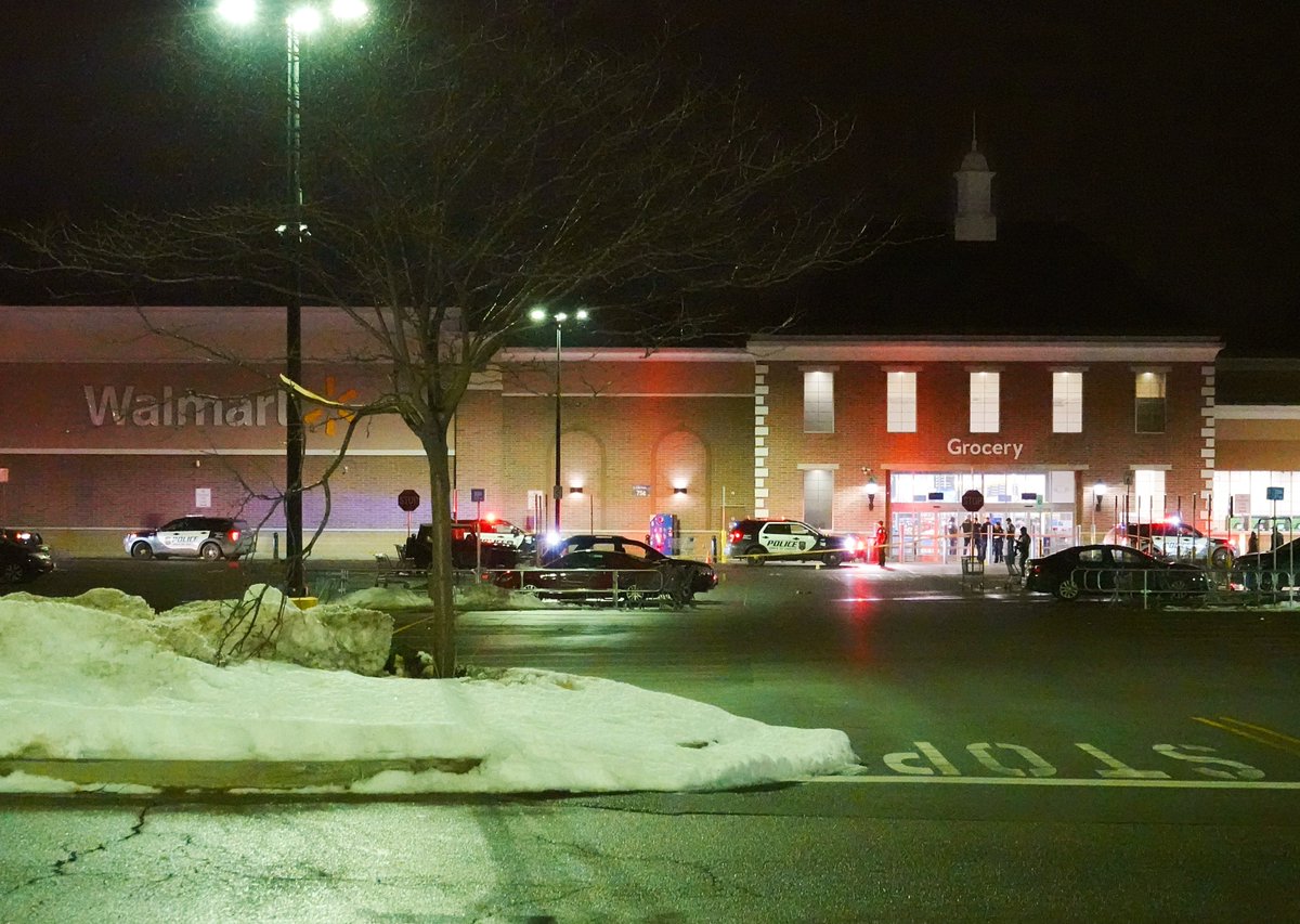 Reported shots fired incident at the Northgate Plaza Wal-Mart in Greece. Lots of police response, evidence markers on the ground in front of the entrance.