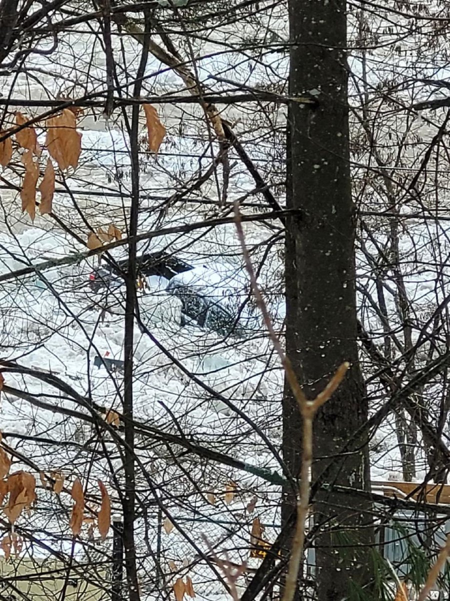 MULTIPLE CARS stuck in the Au Sable River. Photo courtesy of Kevin Zaumetzer who took these in Au Sable Forks, where he says an ice jam is causing flooding to several homes