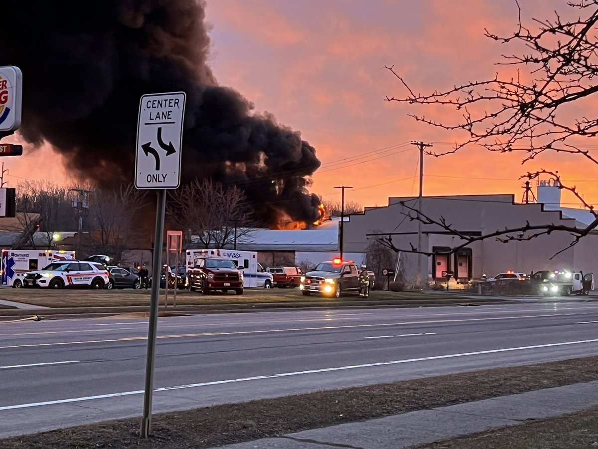 Route 104 in Williamson is shut down. Large fire at Thatcher. Fire appears to be at the rear of the property/structure. The smoke can be seen for miles down 104