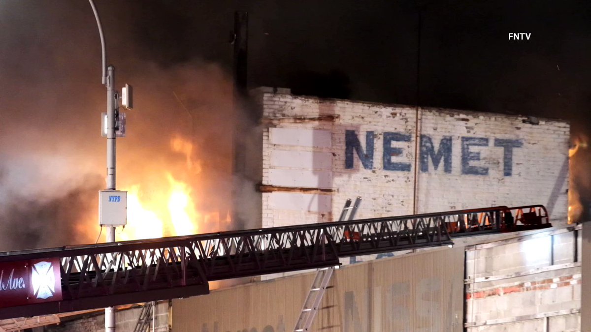 Huge blaze in where heavy fire burned through a car dealership in Jamaica, Queens on Wednesday night. All members were evacuated from the building 153-23 Hillside Avenue