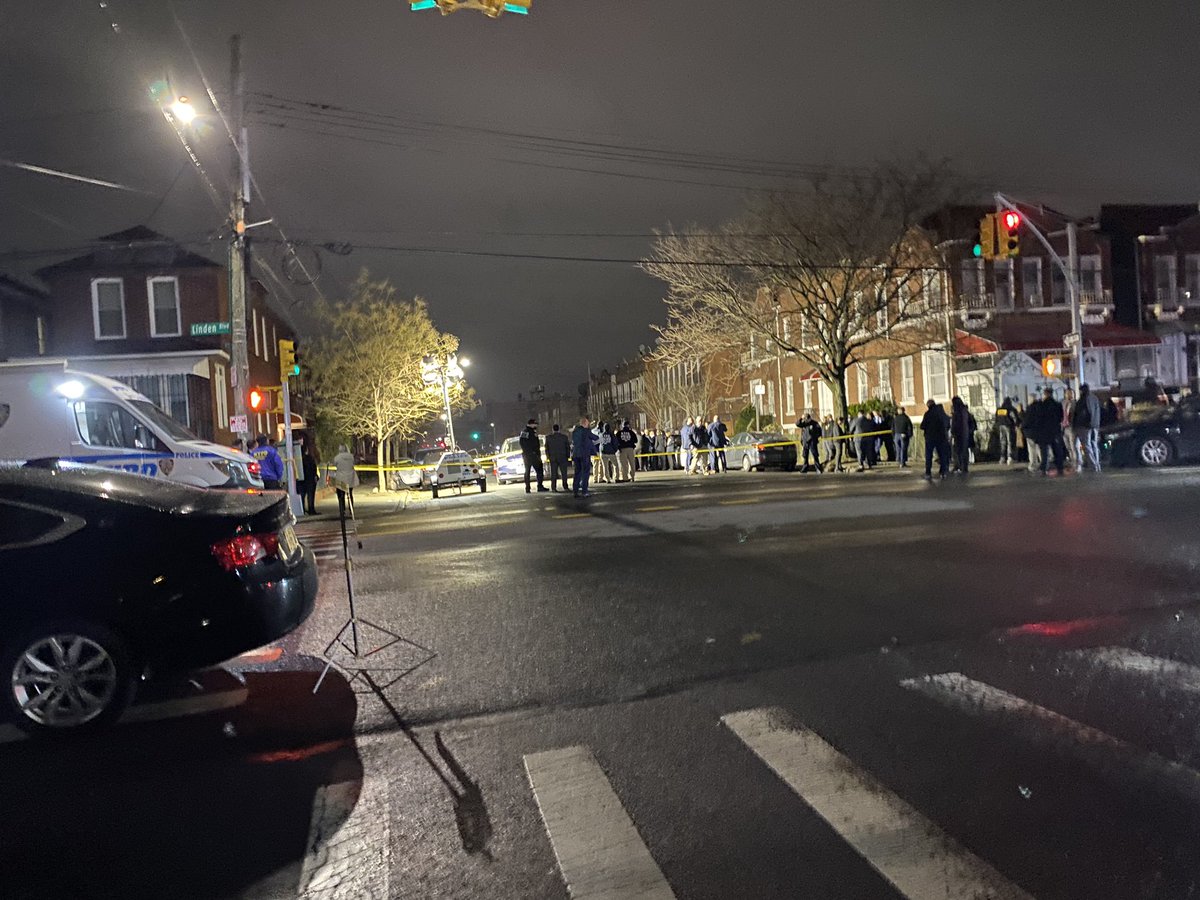 The scene of a shooting in East Flatbush where a 12-year-old boy was shot in the head and killed while sitting in a car.  another woman was shot, she's expected to survive. A 7-year-old girl was also in the car and not hurt