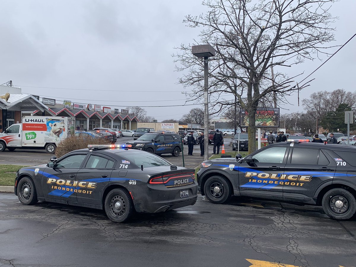 It looks like @nyspolice and @IrondequoitPD have the suspect they were looking for.  UHaul is parked at a plaza along E Ridge Road.  Witness tells man has been taken from it.  Dozens of officers on scene.