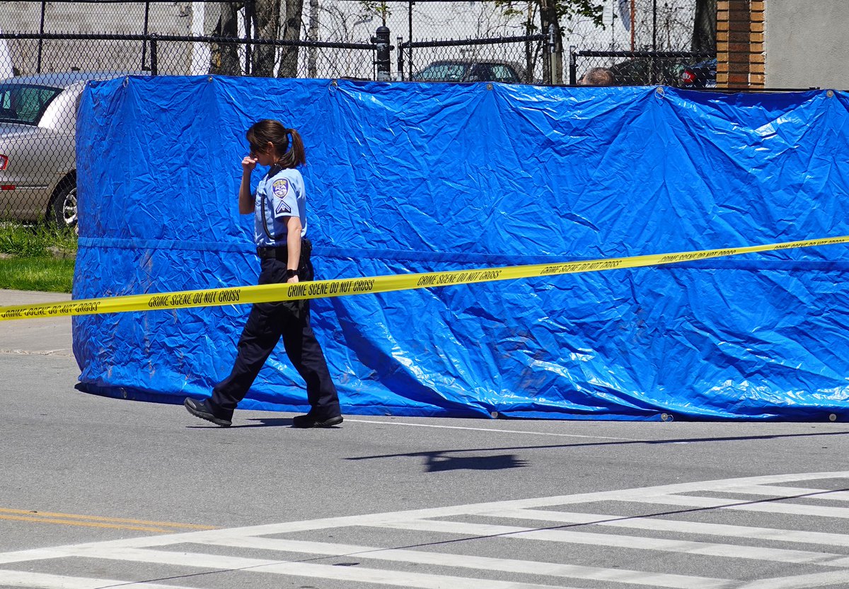 Soon after the Pierpont St call, another reported shooting at N Plymouth Ave and Smith St. Tarp up at the scene. Command Van is also here.