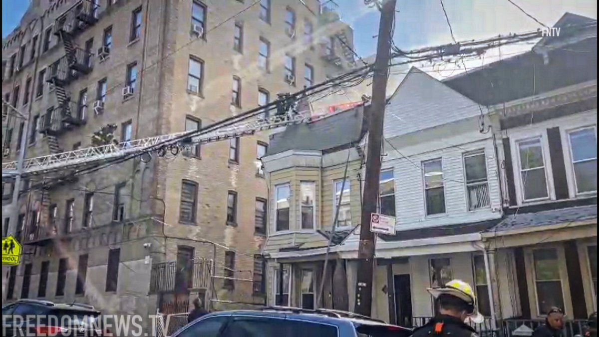 Firefighters battling the intense blaze at 2194 Valentine Avenue in the Bronx have transmitted a 4th-Alarm, as the fire has now spread to attached structures. EMS is treating 6 people at the scene with minor injuries.  