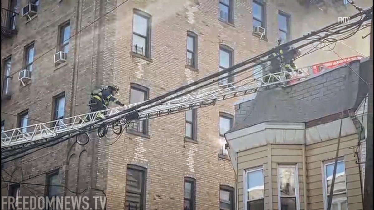 Firefighters battling the intense blaze at 2194 Valentine Avenue in the Bronx have transmitted a 4th-Alarm, as the fire has now spread to attached structures. EMS is treating 6 people at the scene with minor injuries.  