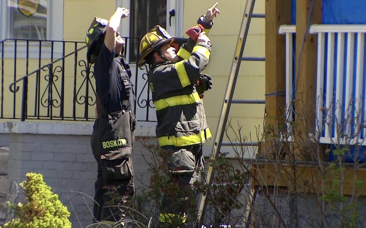 .@RFDPIO1 firefighters made quick work of a house fire on Oneida St this afternoon. FFs say a man was on the roof of the porch trying to put the fire out with a garden house when they arrived. Two dogs who were inside the home are doing well