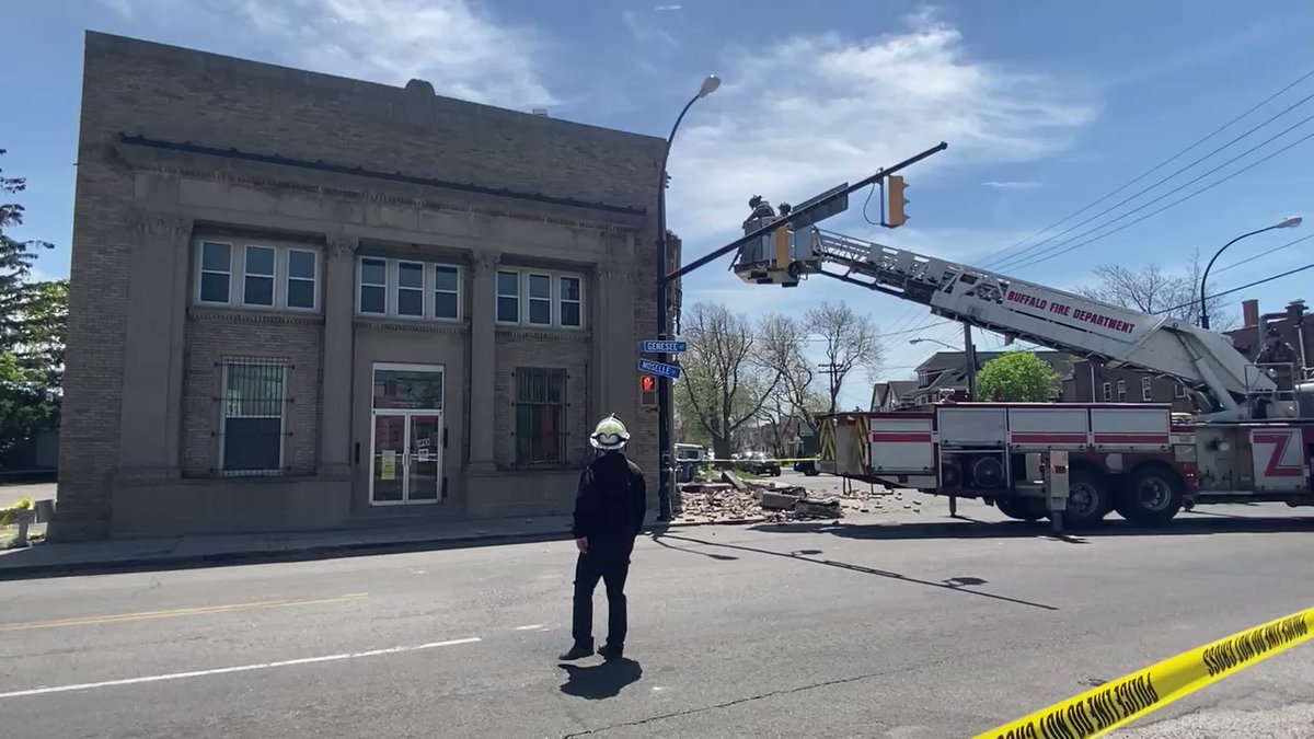 A Buffalo Fire ladder truck repositioned and crews are now removing loose debris that remains on the side of the Juneteenth Festival building.   Fire chief on scene tells they have no update right now as they're still assessing the situation