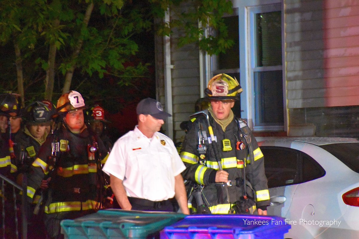 Rochester Firefighters on scene of a vehicle fire with extension to two dwellings on Inglewood Drive