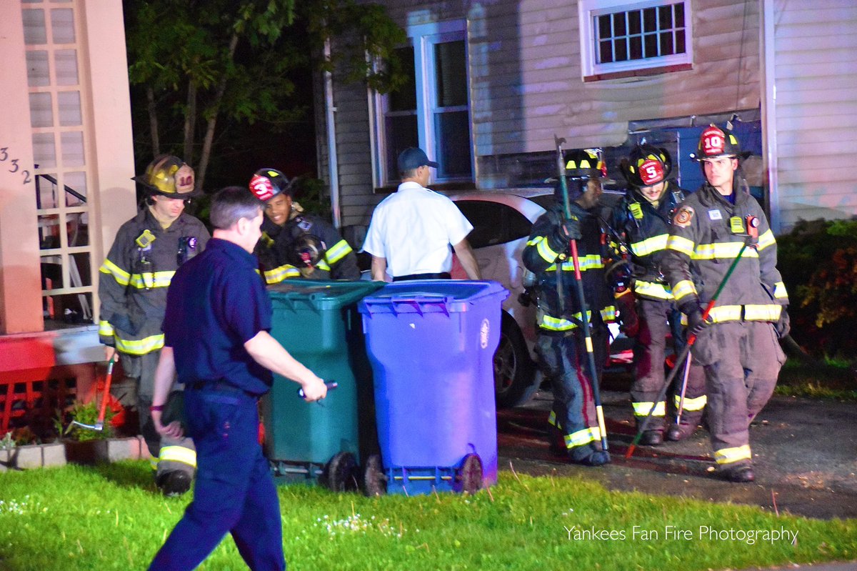 Rochester Firefighters on scene of a vehicle fire with extension to two dwellings on Inglewood Drive