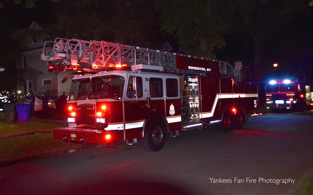 Rochester Firefighters on scene of a vehicle fire with extension to two dwellings on Inglewood Drive