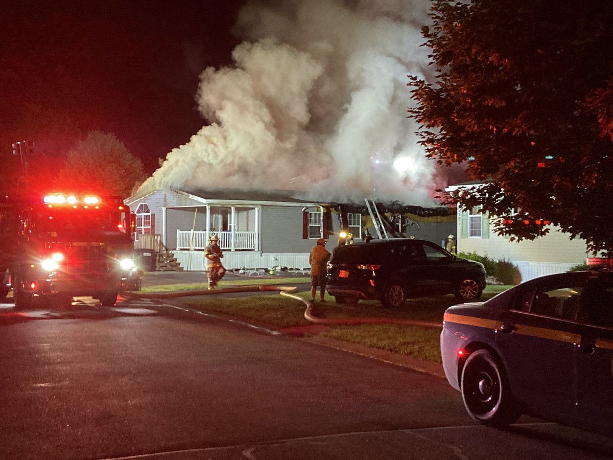 On scene of a house fire on Stillmeadow Way in Williamson.  Smoke billowing out of all sides of the roof of the single-level home.  No word yet on injuries or cause