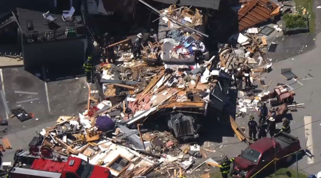 Truck smashes through  Junior's Lounge on Salt Point Turnpike in Poughkeepsie . dozens of first responders on scene digging through debris .