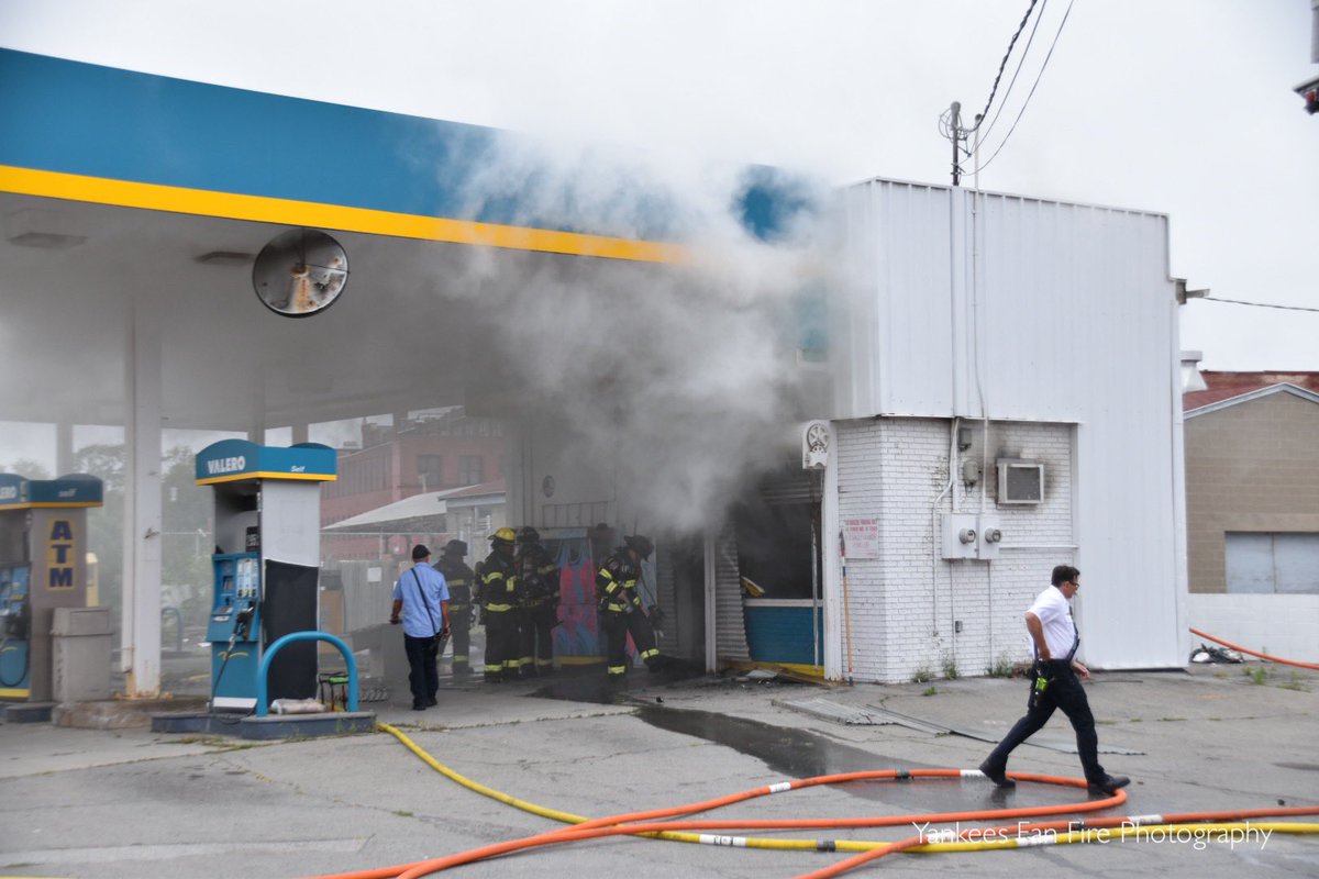 The Rochester Fire Department battling a working fire in a vacant gas station this afternoon on West Main Street