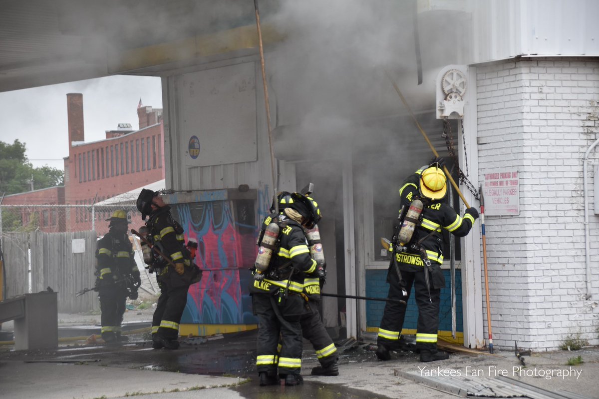 The Rochester Fire Department battling a working fire in a vacant gas station this afternoon on West Main Street