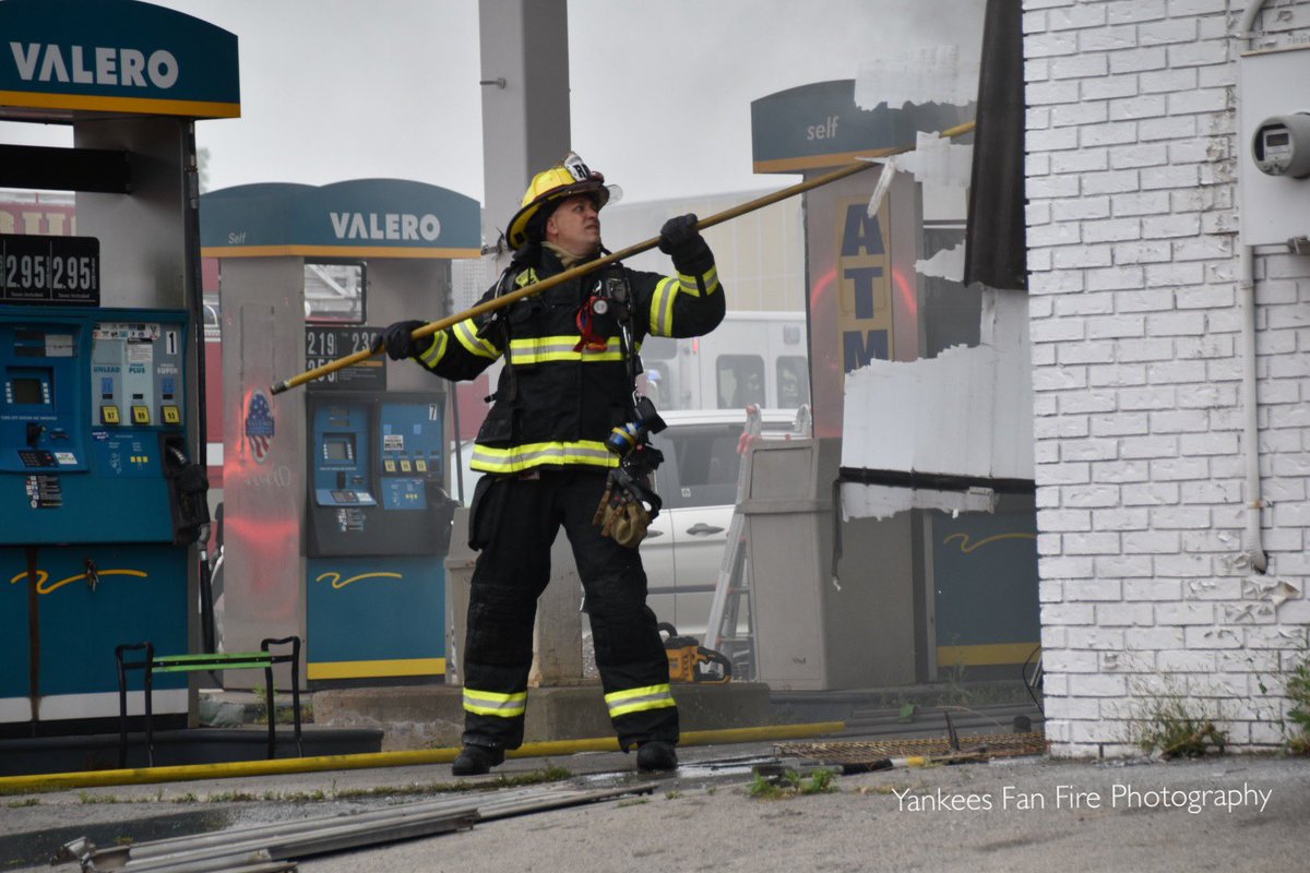 The Rochester Fire Department battling a working fire in a vacant gas station this afternoon on West Main Street