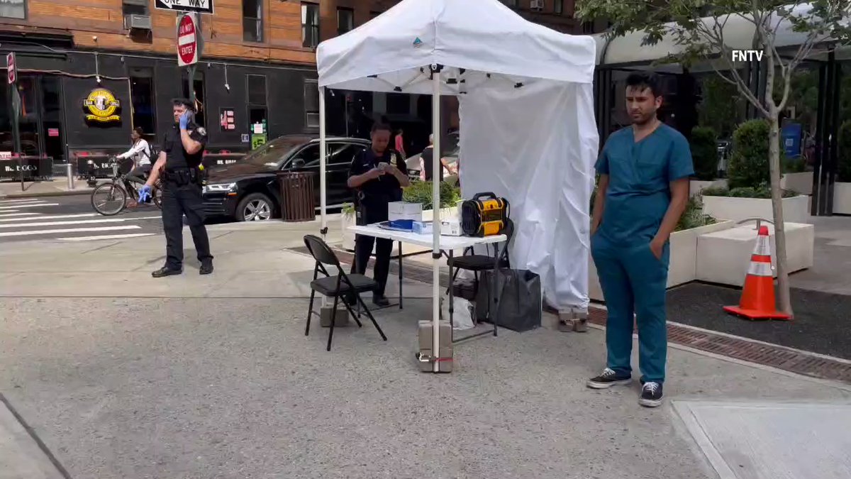 A person was slashed on W 43rd street and 10th Avenue, near a COVID 19 testing tent. Witness reports seeing three people fighting, resulting in slashing.  Police are searching for the suspect.