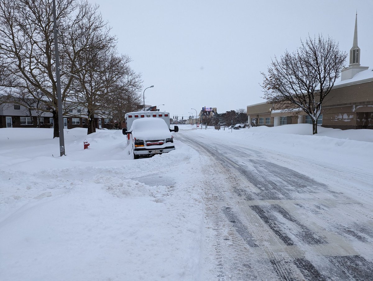 There were too many stuck cars to count. These two below were on West Tupper and Allen.  This abandoned ambulance on Goodell Street really hit me knowing that the medical campus and Ellicott Street was so close