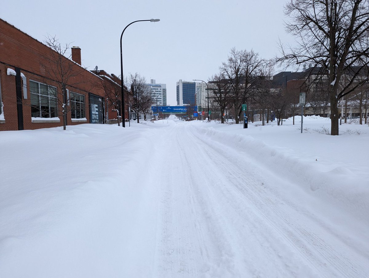 There were too many stuck cars to count. These two below were on West Tupper and Allen.  This abandoned ambulance on Goodell Street really hit me knowing that the medical campus and Ellicott Street was so close