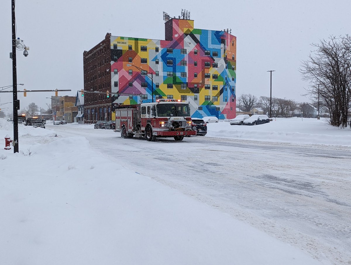 There were lots of emergency personnel and snow clearing crews out.   stuck car and flashing lights in the distance.  Buffalo Firefighters drove by me on Main Street and some contractors were out clearing snow on Linwood