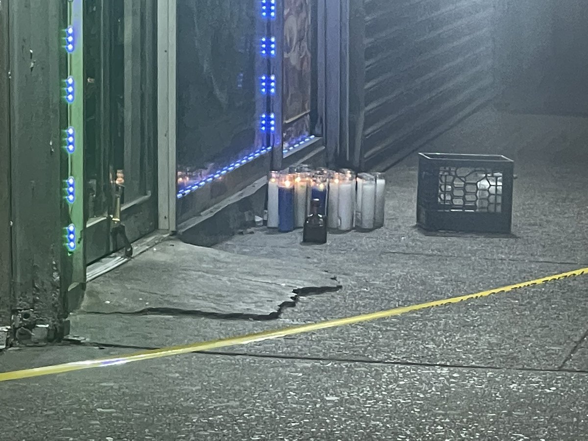 A 28yo man is dead & 3 others injured in East Tremont shootings tonight. One of the scenes, outside this deli on E Tremont Ave, had memorial candles outside from a different fatal shooting on Monday. 