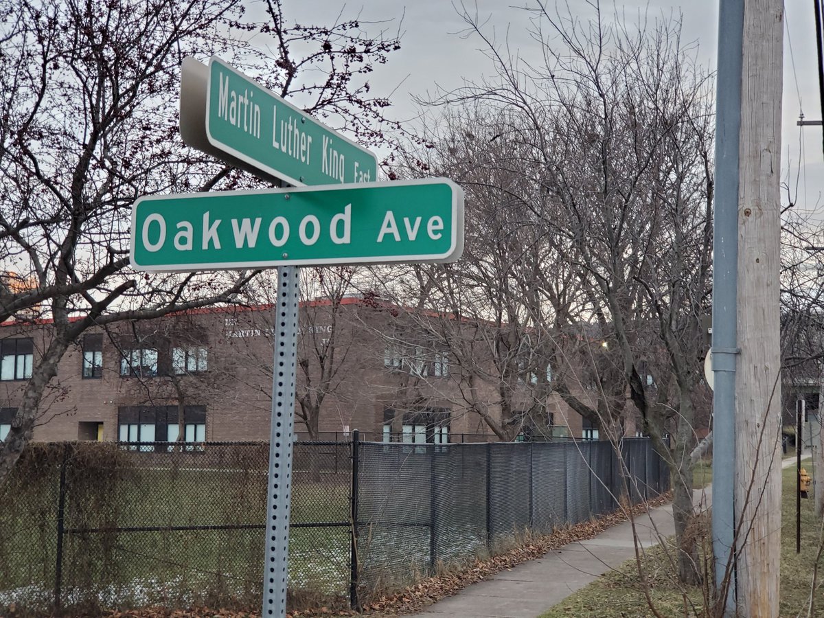 An 11-year-old girl was shot to death last night on this block in a double drive-by shooting in Syracuse NY. She had just bought a gallon of milk from this store for her family. The site is just downhill from the vaunted 