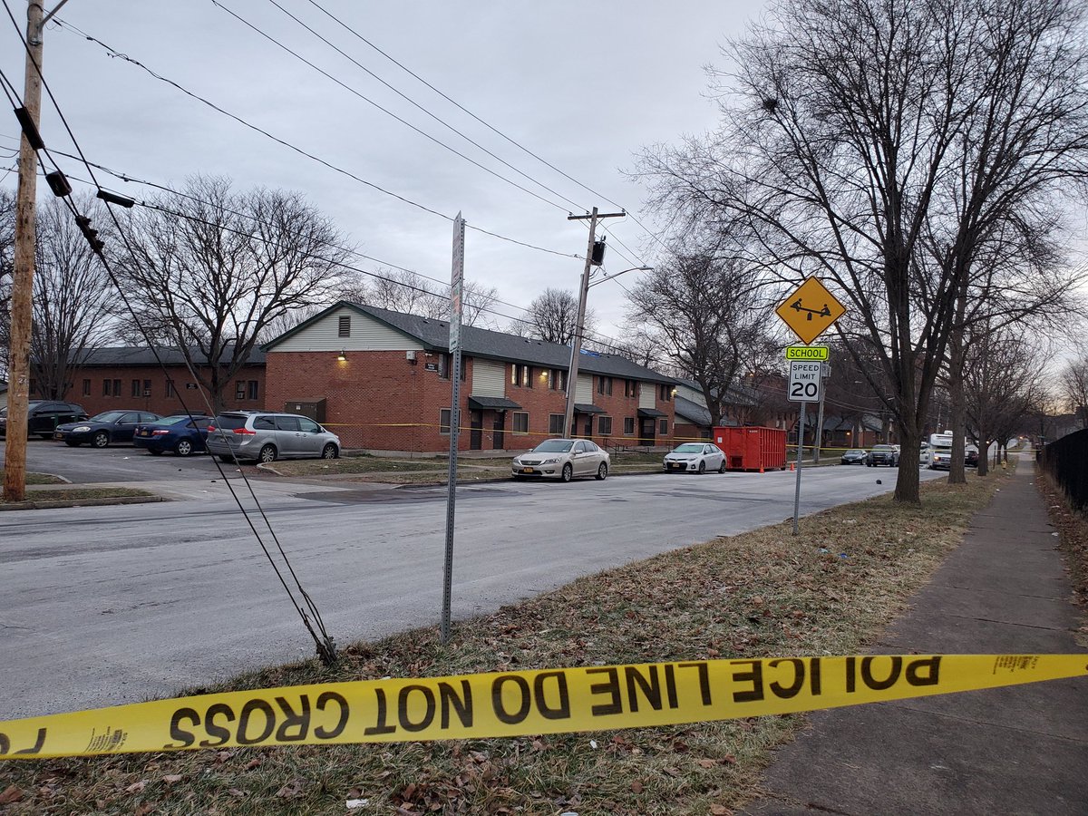 An 11-year-old girl was shot to death last night on this block in a double drive-by shooting in Syracuse NY. She had just bought a gallon of milk from this store for her family. The site is just downhill from the vaunted 