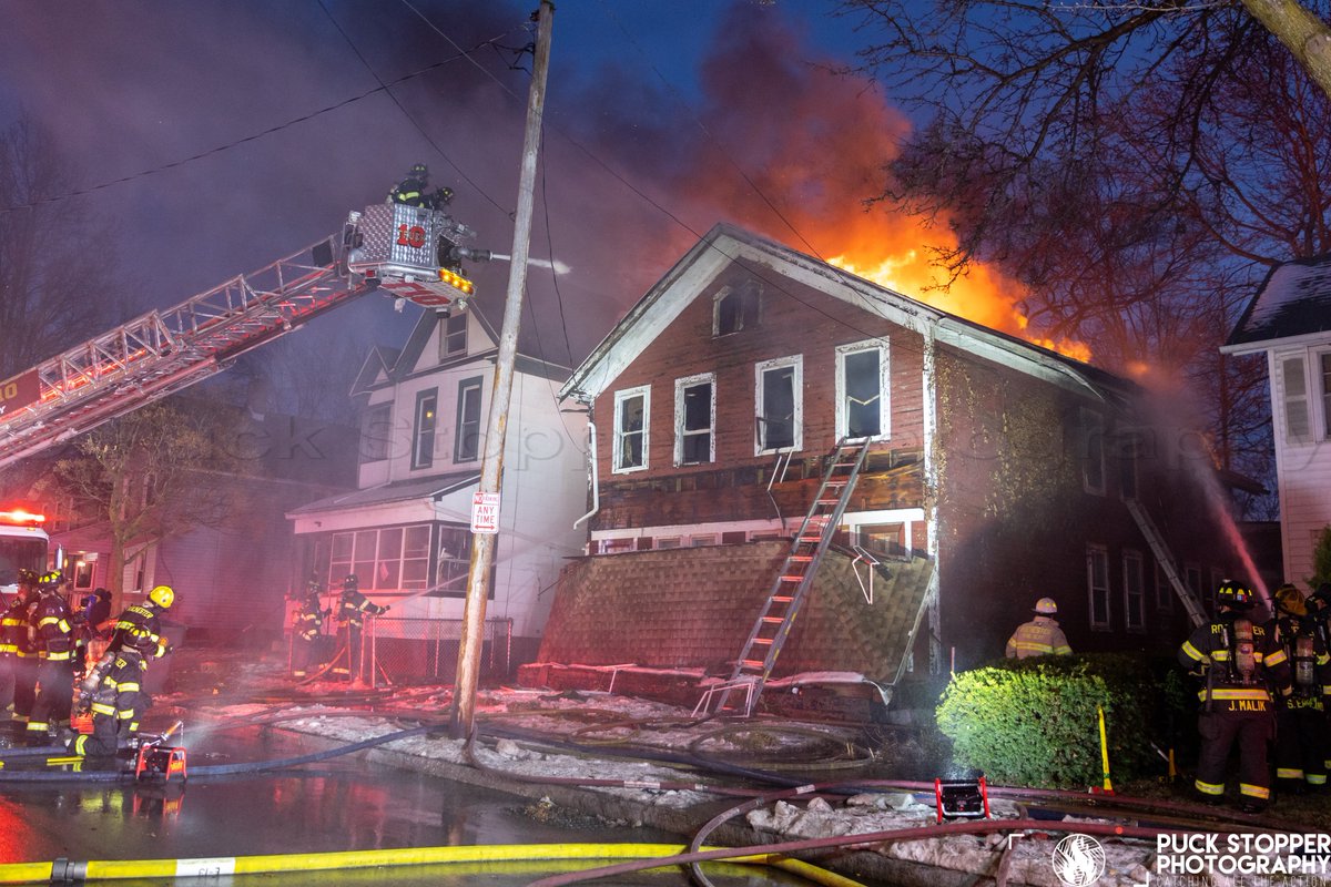 This evening Rochester firefighters worked a second alarm house fire on Verona Street. Units arrived to find heavy smoke and fire showing from a vacant dwelling. High winds rapidly spread the flames forcing crews to go defensive.