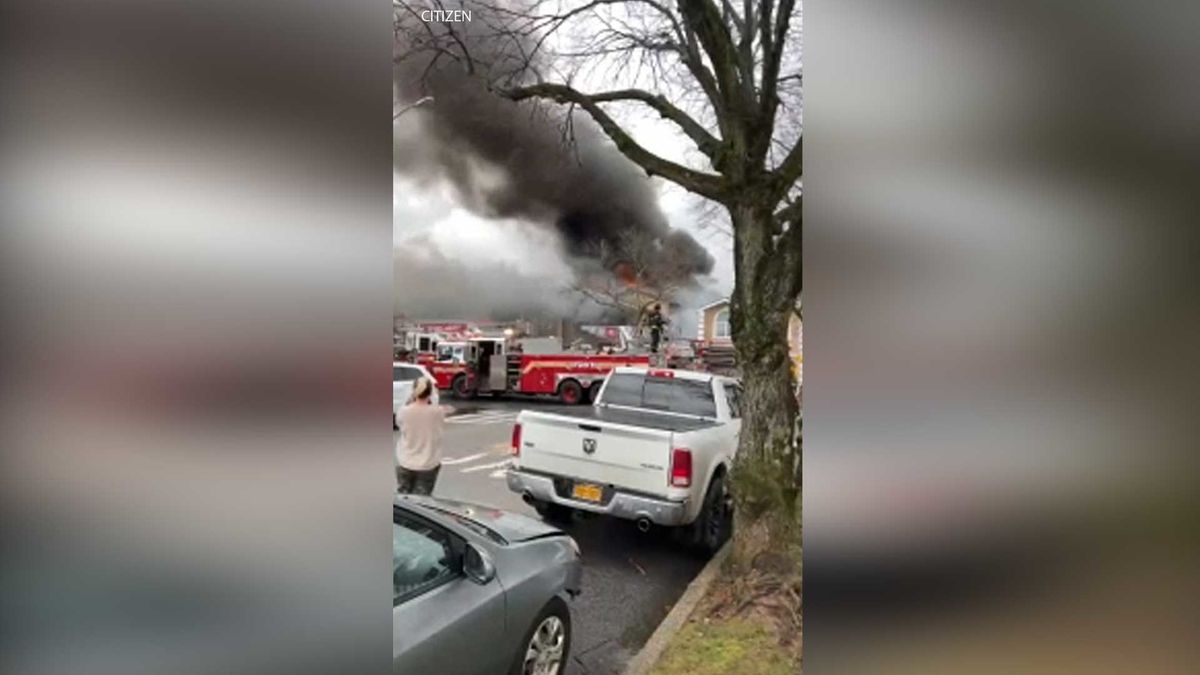 Multi-alarm fire burning on Staten Island, 2 firefighters critically injured