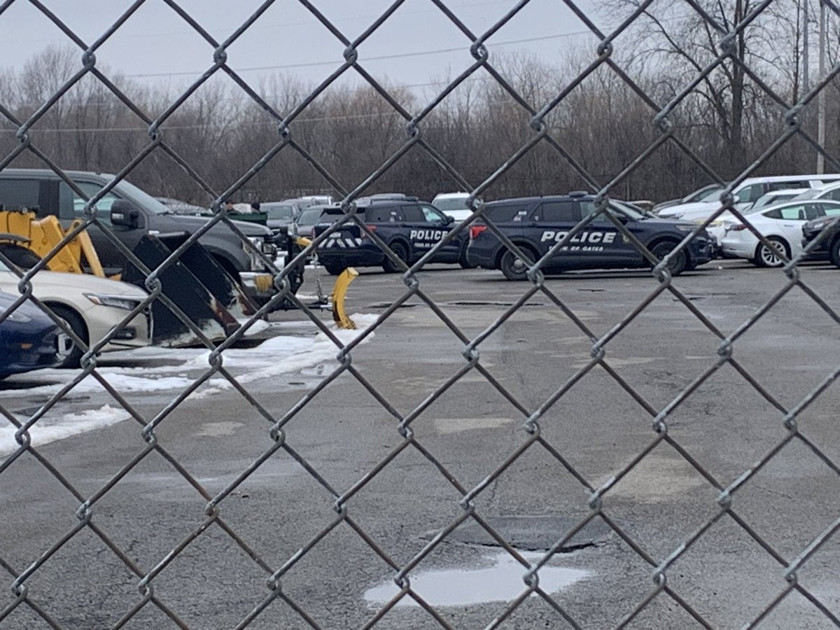 @GatesPolice are on scene at the Hertz rental facility across from the airport.  They have a number of cars surrounding a vehicle that was recently returned. 