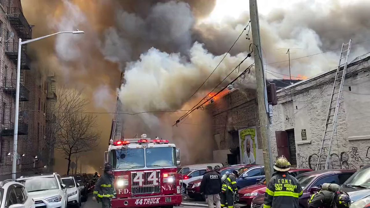 Firefighters fighting massive 5-alarm fire in the Bronx, New York.   Cause and number of injuries unknown