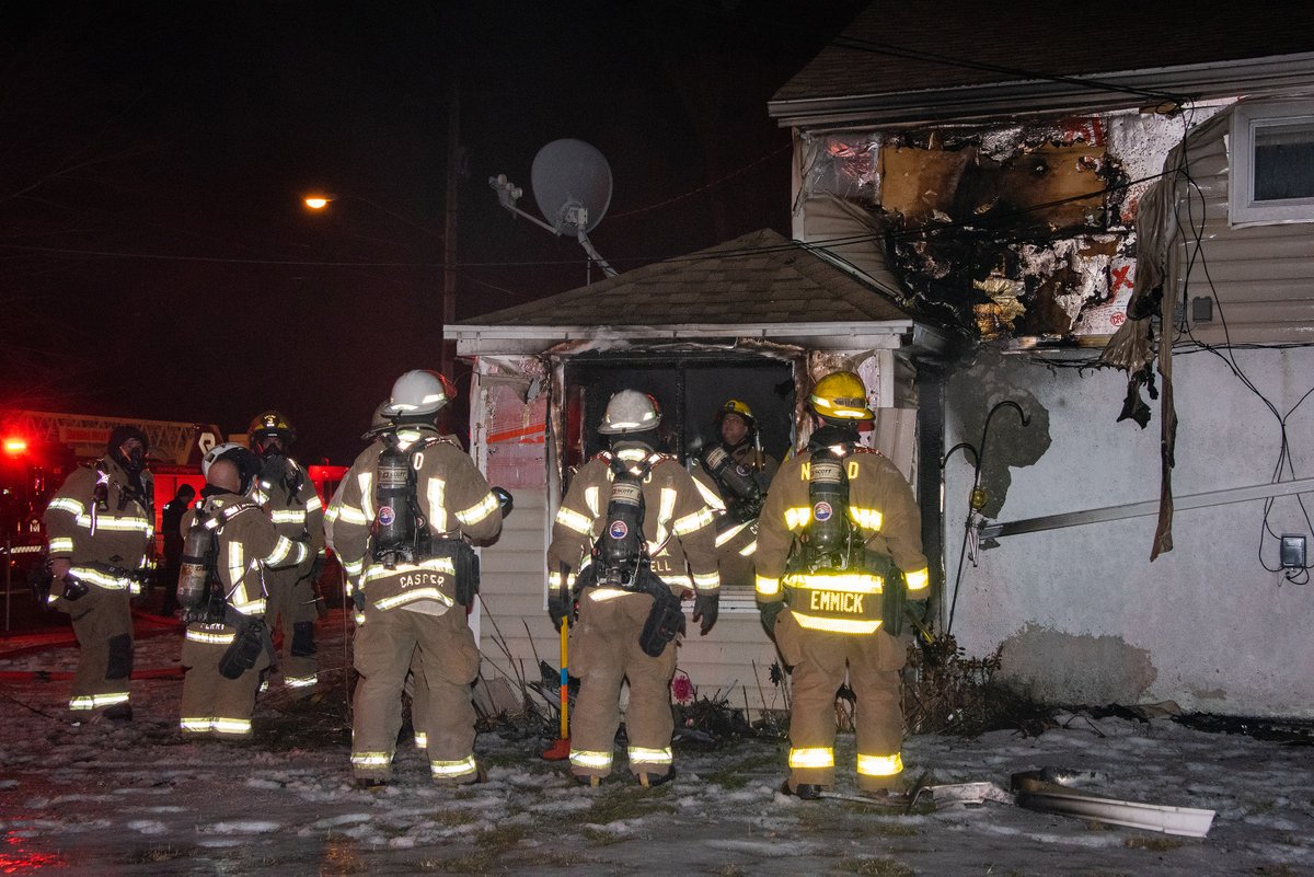Emergency crews helped a woman to safety while responding to a house fire on the 7300 block of Girard Avenue early Wednesday morning. No one was injured and a lit cigarette is the suspected cause of the blaze