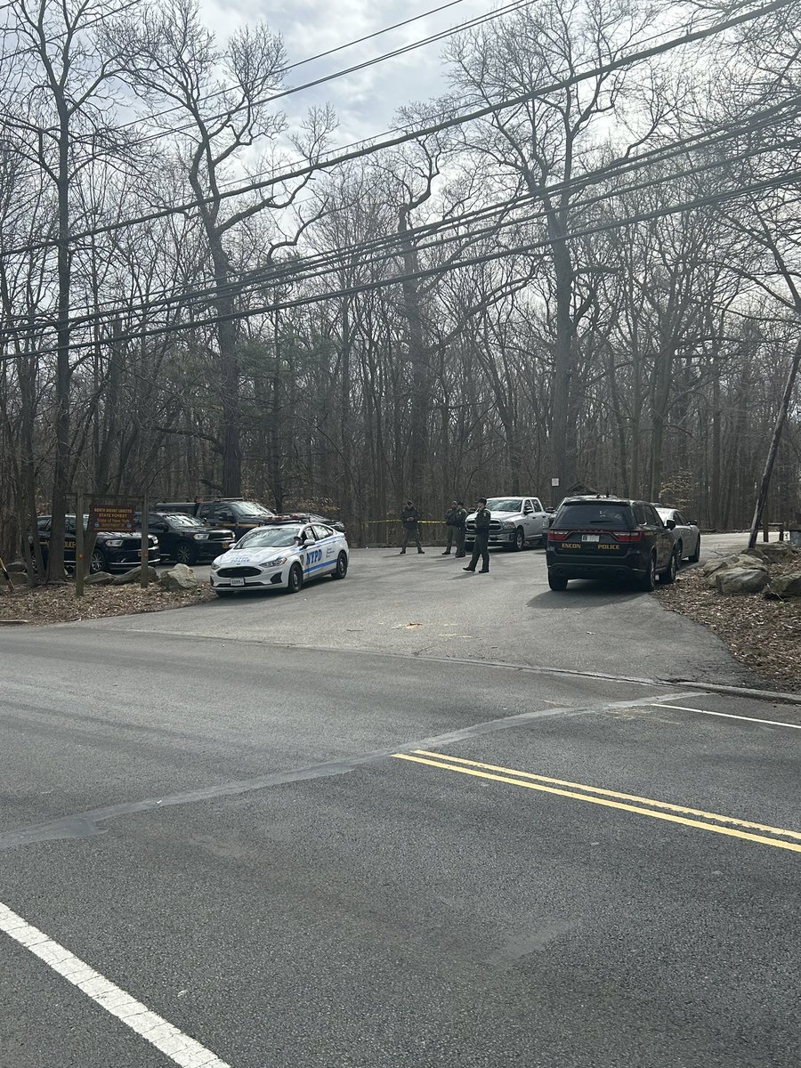 .@NYPDnews now on the scene on Amboy Road in StatenIsland after a human hand was found by a man walking his dog Thursday in the woods of Mount Loretto State Forest