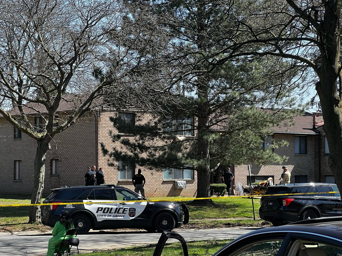 Greece Police have a Grecian Gardens apartment building surrounded on Grecian Gardens Drive. Officers have long guns out and shields. There is no official word on what';s the cause of the large police presence