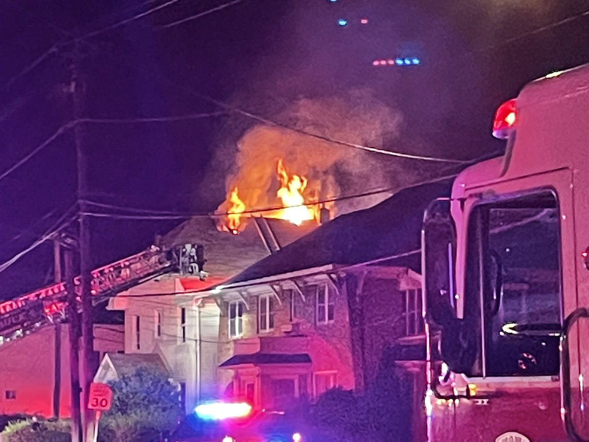 Fire has rekindled and heavy flames shooting from the roof