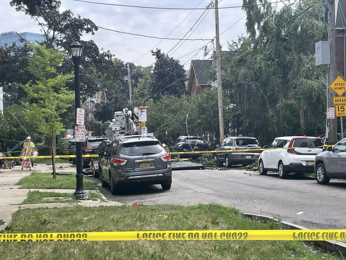 A part of someone roof is in the middle of the street on Whitney Avenue. Powerlines are also down.  hear generators and chain saws working to clear the way for life to get back to normal, as much as possible, in Downtown Buffalo