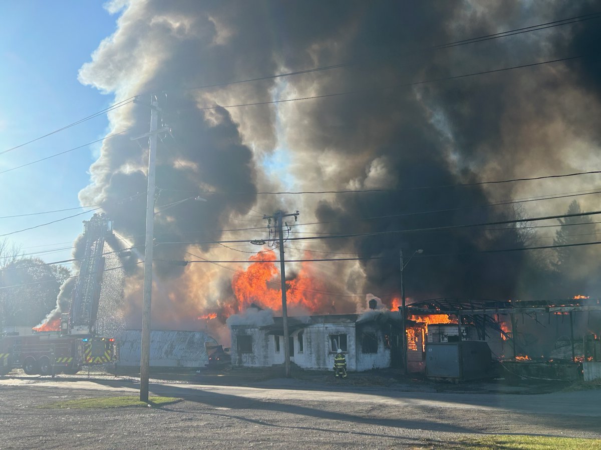 Firefighters from several companies are at the scene of a fire on Howard St. in the city of Batavia. The structure is a warehouse believed to be owned by @BaskinLivestock