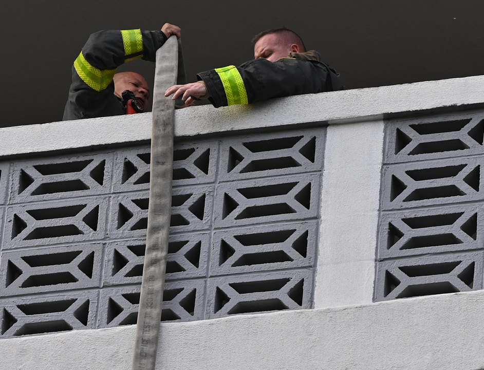 Firefighters battled a three alarm fire in a large apartment building at 86-10 151 Avenue in Howard Beach, Queens on Thursday morning