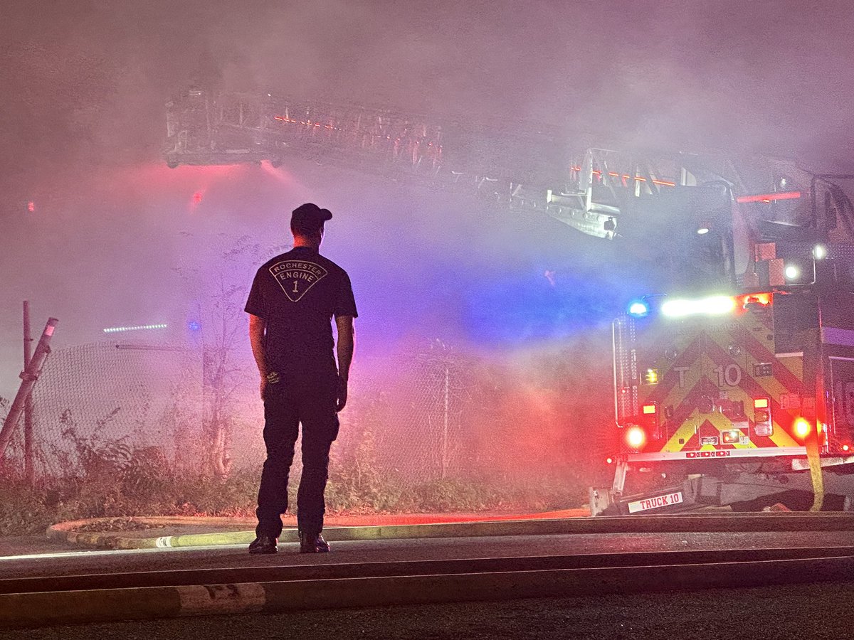 Collapse zone established. Most of the visible fire on the front of the building is knocked down. Heavy smoke still pushes from the 4th floor