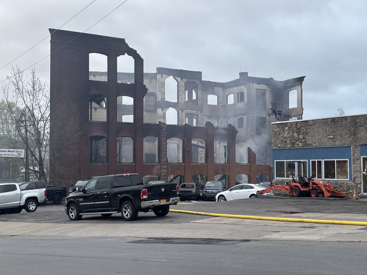 A massive fire erupted in Gloversville Tuesday night, engulfing a vacant building that once housed a commercial knitting mill. 