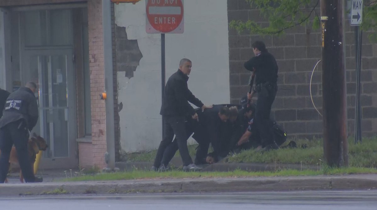 Greece Police chase down this person and put them in handcuffs around Dewey Avenue.