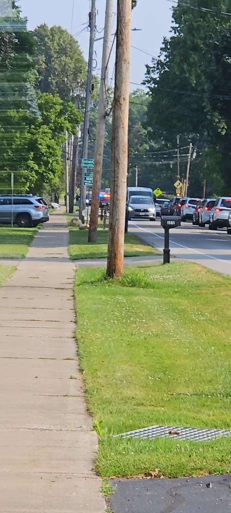 Heavy police/sheriff presence on Creek street near Embury road in Penfield NY.  Road is blocked in both directions