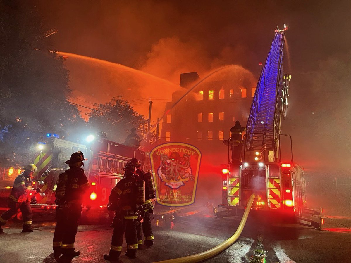 CFPA New York member Jon Tenca   reports the original fire building has partially collapsed, and fire has jumped to an additional mill building. A 5th alarm has been transmitted
