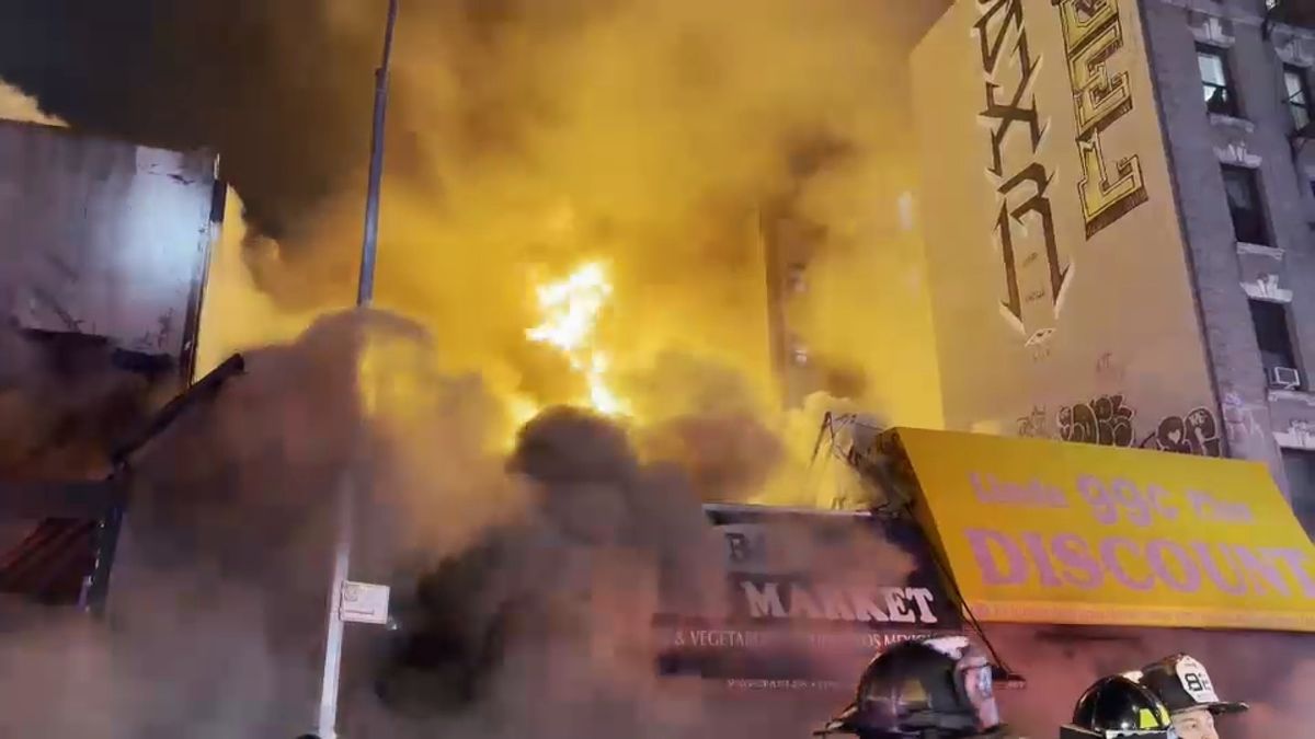 5-alarm fire rips through several businesses and apartment building; 1 injured