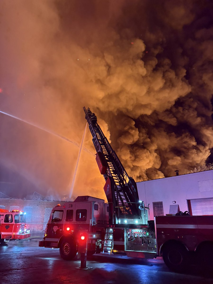 Firefighters currently battling a blaze on Lyell Ave
