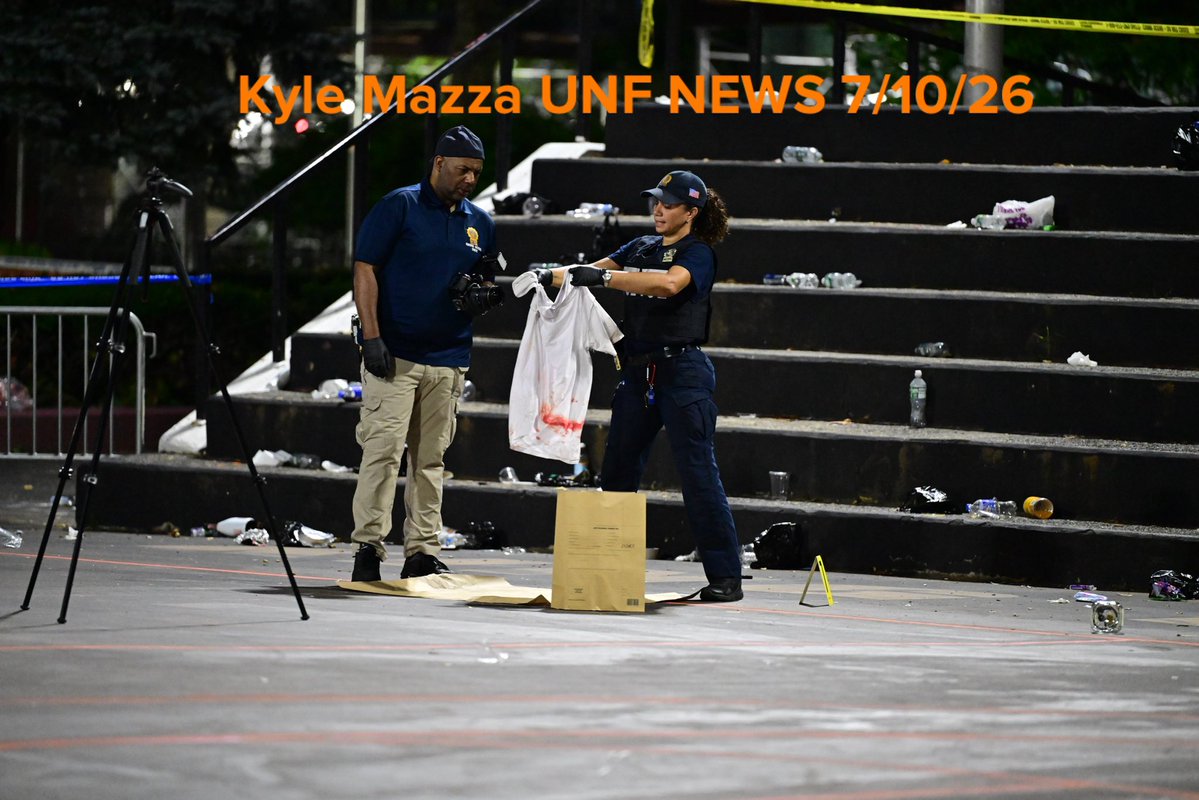 Members of the NYPD Crime Scene Unit work the scene where a 35-year-old man was killed and a 28-year-old man along with a 22-year-old woman were injured after a shooting inside of a basketball court at 70 Lenox Avenue within the confines of the 28 precinct PSA 5 in Manhattan, New York, United States