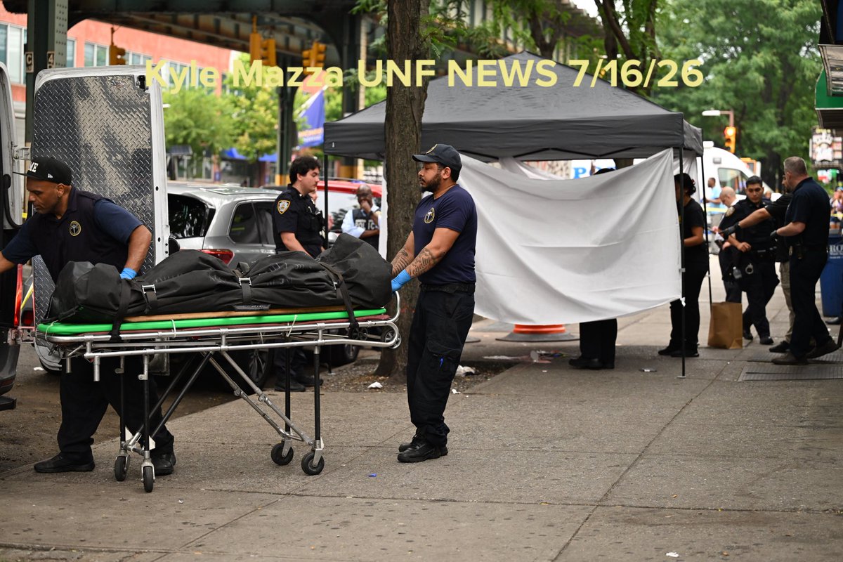 The body of a 29-year-old man who was fatally shot to the head is removed from the outside of a restaurant and lounge at 2362 Jerome Avenue within the confines of the 46 precinct in Bronx, New York, United States  